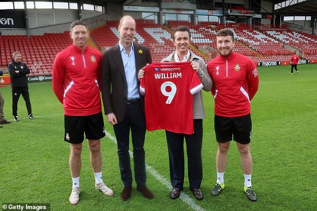 Prince William received a personalized Wrexham shirt at the Racecourse Ground last month