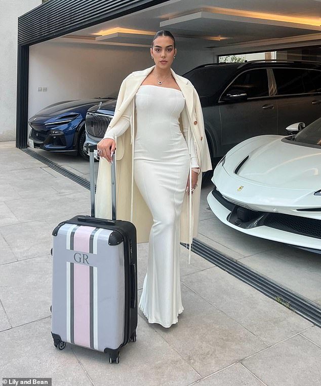 Cristiano Ronaldo's girlfriend Georgina Rodriguez showed off her incredible figure in a figure-hugging cream maxi dress as she is unveiled as the new face of a luggage brand, in a photo exclusively obtained by MailOnline on Sunday