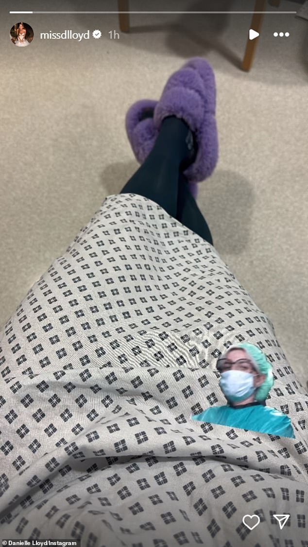 The influencer sparked concern after she posted a photo on Instagram wearing a medical gown in a hospital ward