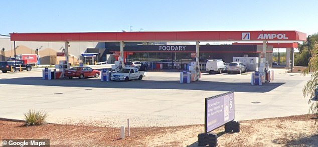 A man has been arrested after another man died following an alleged attack at an Ampol petrol station (pictured) in Dawesville, Western Australia on Friday morning
