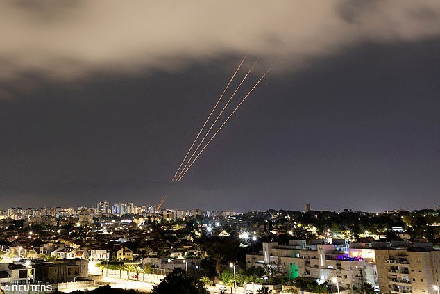 An anti-missile system goes into action after Iran launches drones and missiles towards Israel, seen from Ashkelon, Israel on April 14, 2024