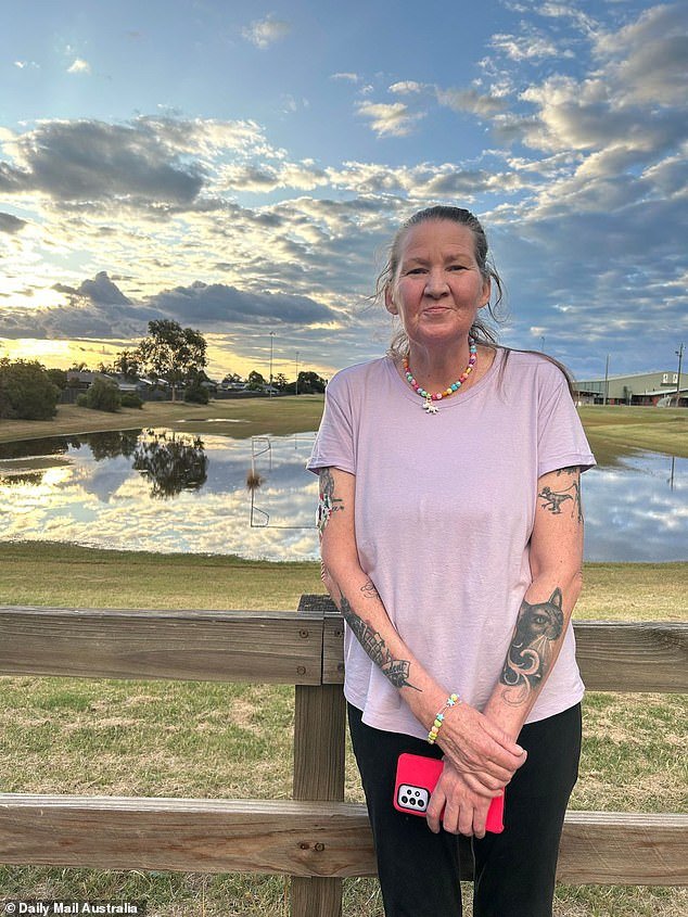 Emma Bates (pictured), 49, was found dead at her home in Cobram, close to the NSW border in Victoria's far north, about 2.15pm on Tuesday after suffering injuries to her upper body and face