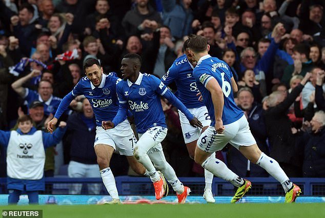 Idrissa Gueye celebrates the goal that secured Everton safety in the Premier League