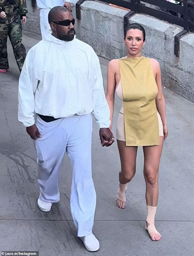 Fans have targeted Disneyland California for letting Bianca Censori, 29, (right, with Kanye West) walk through the theme park without shoes on Tuesday