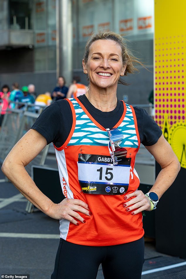 Gabby Logan, 50, posed on the start line as she prepared for the London Landmarks Half Marathon on Sunday morning