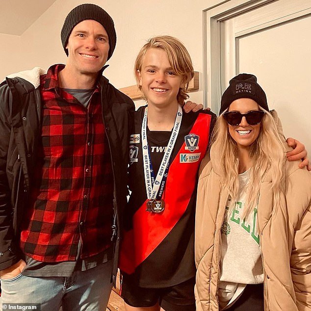 Cam Mooney and his son Jagger and wife Seona Hill.  Jagger is a rising Aussie Rules star like his father, but doesn't have to undergo skinfold testing like his famous father did