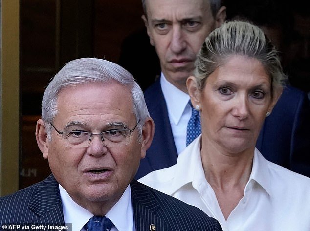 Menendez could seek exoneration at his bribery trial in May by blaming his wife Nadine (pictured right).  New court documents suggest he will say she kept him in the dark about dealings with New Jersey businessmen