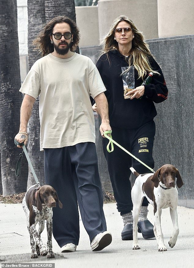 Haidi Klum, 50, and husband Tom Kaulitz, 34, went dog walking with their two German Shorthaired Pointers after a lunch stop in Los Angeles' Studio City neighborhood