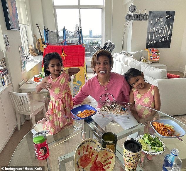 Hoda Kotb pictured in her Upper Manhattan apartment with her daughters Hope and Haley