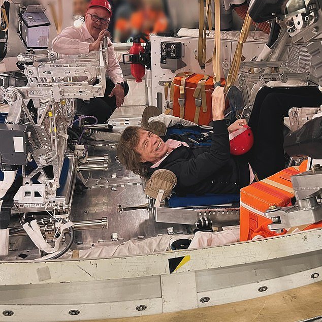 The Rolling Stones frontman met with a series of astronauts, checked out NASA's mission control room and was strapped into a spacecraft simulator during his visit Friday
