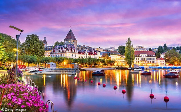 Splendor: Jane Keightley travels to Lausanne, Switzerland to learn about its Olympic history.  Above, the view from the Ouchy Promenade on Lake Geneva