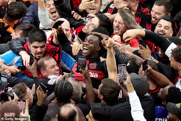 Jeremy Frimpong was at the center of Bayer Leverkusen's celebrations as they finally ended their long wait for a first Bundesliga title last weekend