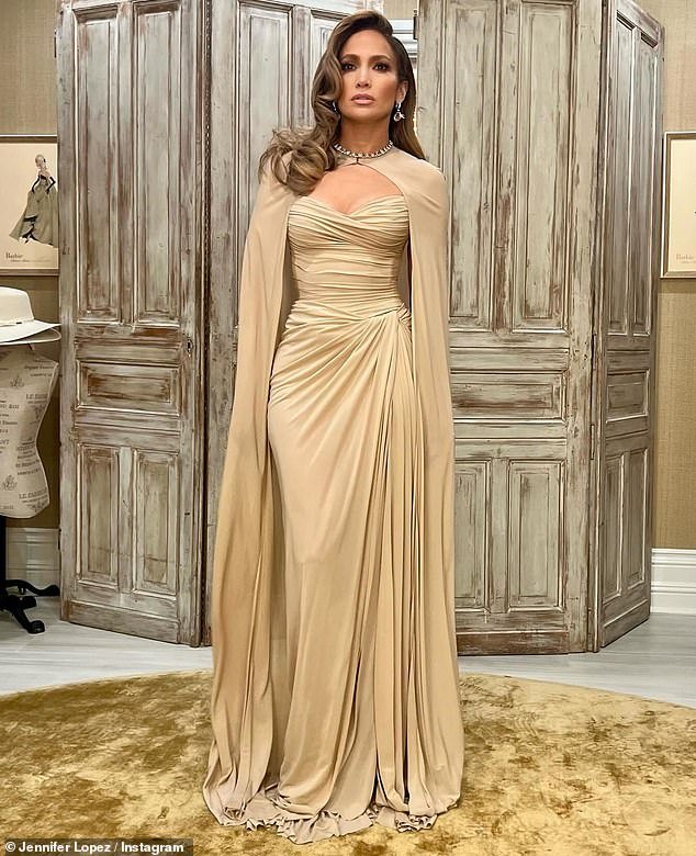 Jennifer Lopez cut an elegant figure in a pale gold dress on Thursday as she attended the Spanish Federation's 2024 annual gala