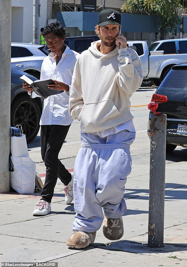 Justin Bieber stepped out in very low-slung Balenciaga sweatpants and a hoodie while grabbing lunch on Wednesday