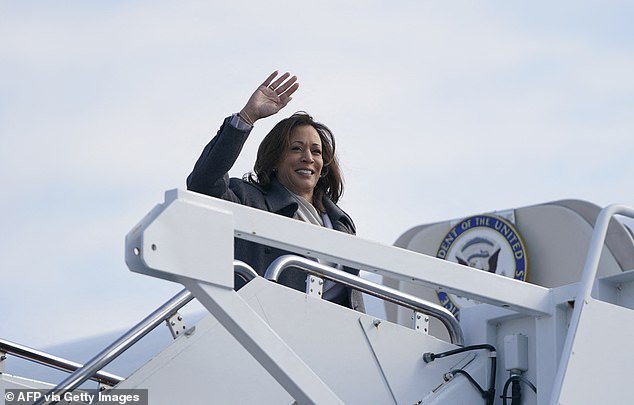U.S. Vice President Kamala Harris waves as she boards Air Force Two as it departs Joint Base Andrews