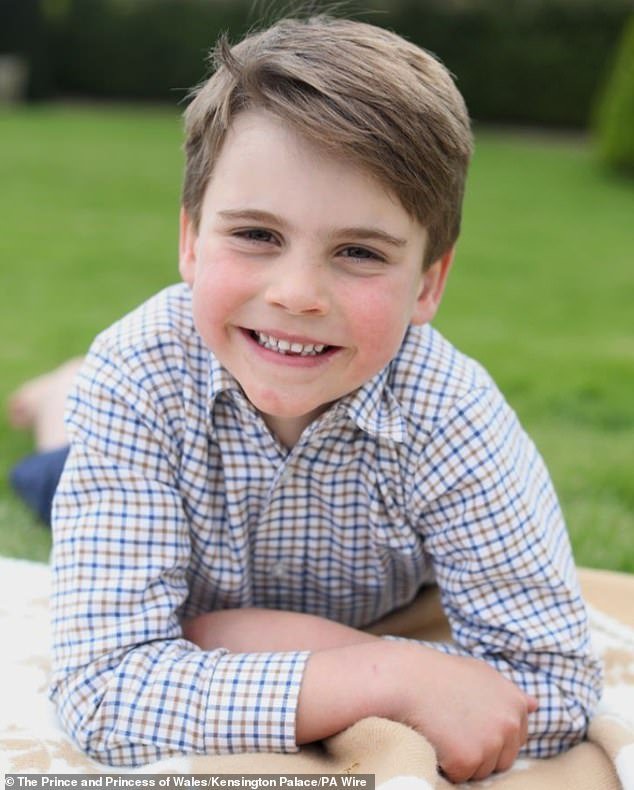 Prince Louis pictured by the Princess of Wales for his sixth birthday.  The image shows the royal family lying on a picnic blanket in the grounds of the Windsor estate