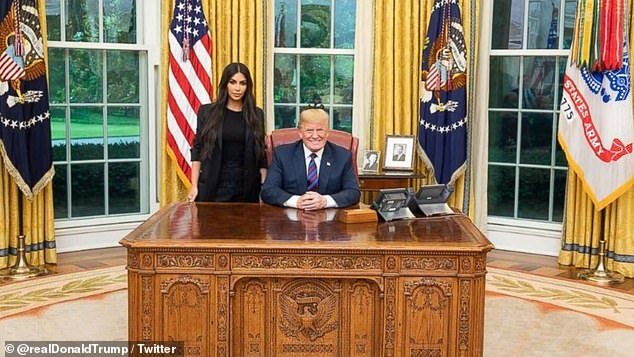 Kim Kardashian (left) poses with former President Donald Trump (right) in the Oval Office on May 30, 2018. Kardashian's first visit to Trump was to ask him to pardon Alice Johnson