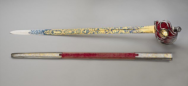 A beautiful sword made for King George IV's historic visit to Edinburgh in 1822 is on display in a new exhibition.  The ceremonial weapon, made of blued steel inlaid with gold, is displayed in the King's Gallery at the Palace of Holyroodhouse