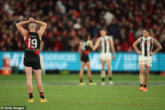 Essendon and Collingwood played out a dramatic draw in their Anzac Day match