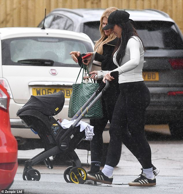 Annie Kilner cut a demure figure as she was spotted stepping out with her newborn for the first time in Cheshire on Friday