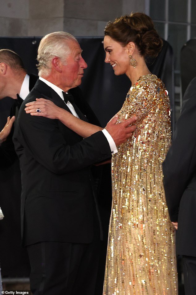 Kate and Charles embrace at the premiere of No Time To Die at the Royal Albert Hall in London, 2021