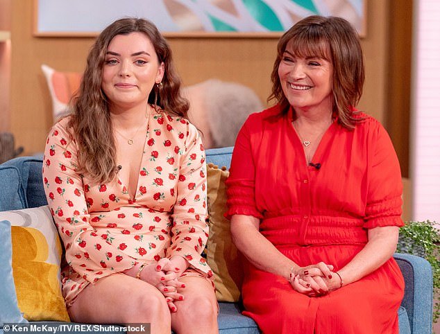 Lorraine Kelly's only daughter Rosie cradled her growing bump as she revealed she was 12 weeks along