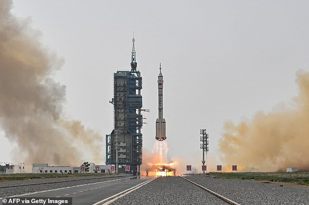 China launched its Shenzhou-16 flight (pictured) in May last year, carrying a civilian astronaut on board the six-month mission