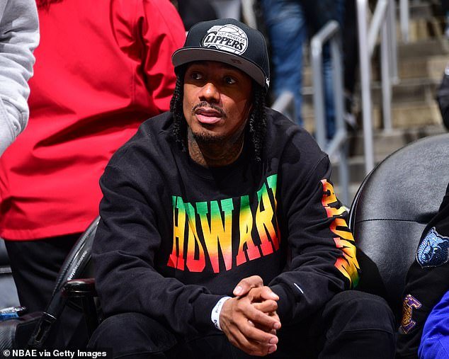 Nick Cannon, 43, shared an image Tuesday of a medical treatment he underwent amid his ongoing battle with the autoimmune disease lupus.  Pictured in LA earlier this month