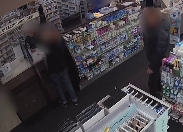 Harrowing CCTV footage showed a man with a knife (right) in a pharmacy in the seaside town of Torquay, 105 kilometers south-west of Melbourne, around 10.45am on Saturday.