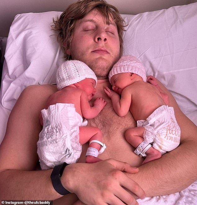 Paddy Pimblett snuggled up with his twin girls Betsy and Margot after their birth last week