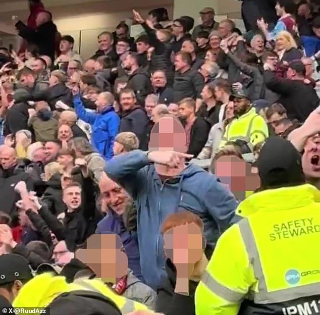 A Burnley supporter has been charged by police with singing tragedies after making alleged airplane gestures at Man United fans on Saturday.
