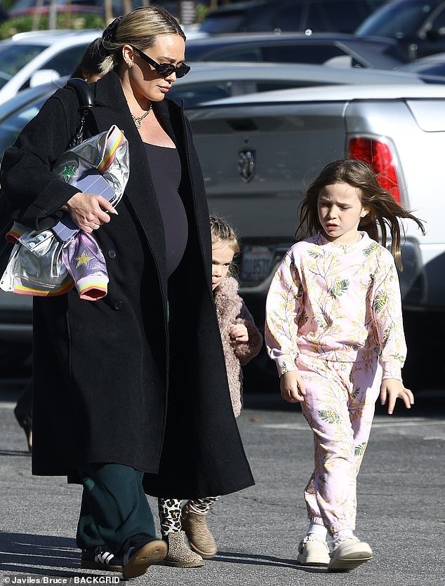 Pregnant Hilary Duff, 36, took her two daughters Banks Violet, 5, and Mae James, 3, out to lunch on Friday - weeks after her husband Matthew Koma's vasectomy