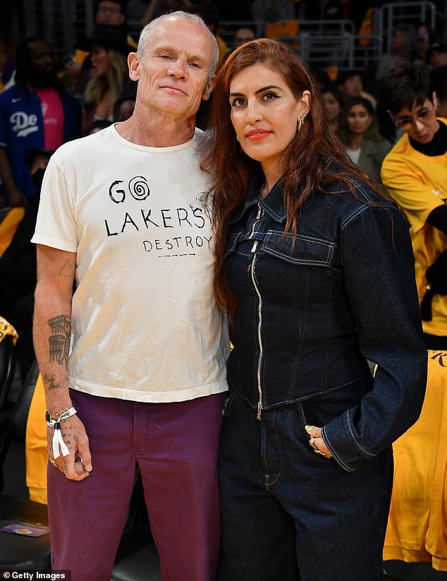 Red Hot Chili Peppers' Flea, 61, and his wife Melody Ehsani, 44, joined Selma Blair, 51, in LA to watch the Lakers lose 105-112 to the Denver Nuggets on Thursday