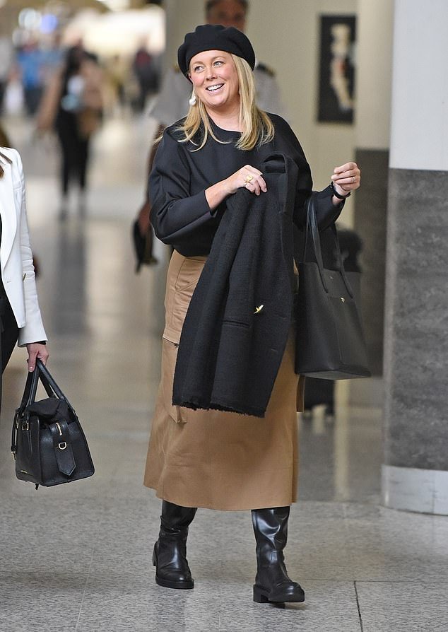 Samantha Armytage was spotted landing at Melbourne Airport on Friday ahead of her former Sunrise co-star Nathan Templeton's funeral