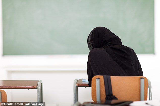 Schoolchildren are converting to Islam in German schools as Christian students feel like outsiders and desperately try to fit in, a new study warns (file image)