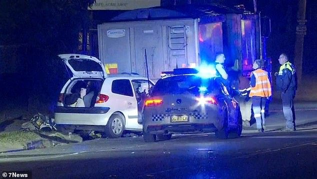A woman and a young boy are fighting for their lives after the car they were riding in crashed into a parked truck in St Marys, western Sydney