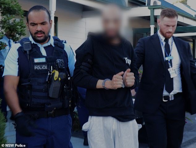 A tenth man (pictured centre) who allegedly took part in a riot outside a western Sydney church after a bishop was stabbed has been charged.