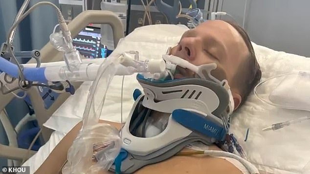 Jared Hill, pictured in hospital, was left paralyzed after being hit by a wave while bodysurfing on holiday in Tulum, Mexico, in February