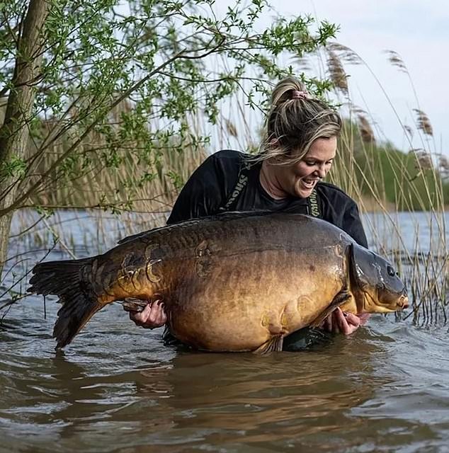 Naomi Turner (pictured) set a new British record when she caught a whopping 30kg carp at Holme Fen Fishery in Cambridgeshire