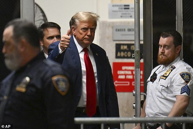 Trump gave a thumbs up to reporters as he left the courtroom during a break in the proceedings
