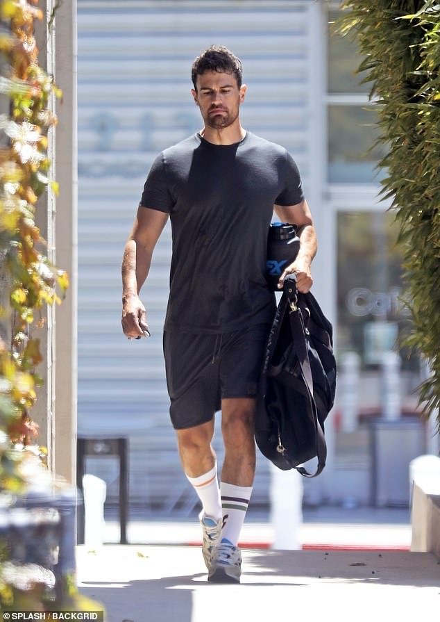 Theo James cut a casual figure as he headed to a local gym in Venice Beach, California, on Wednesday
