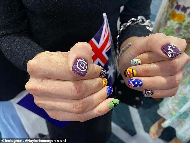 For the exciting occasion, the immigrant had her nails done with various Australian symbols and motifs, from Vegemite to State of Origin and a sunny beach