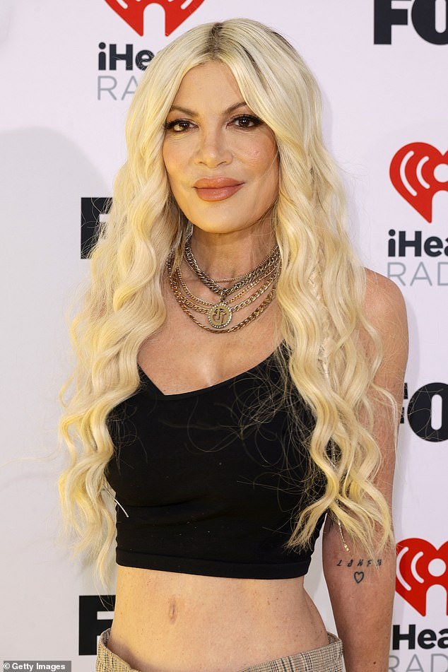 Tori Spelling pushes the boundaries on her new podcast by revealing TMI confessions that have left many long-time fans shocked;  pictured on April 1 in Hollywood