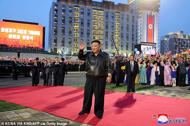 North Korea's rotund leader Kim Jong Un was pictured this week in exceptionally baggy trousers (pictured) as he walked the red carpet at a ceremony