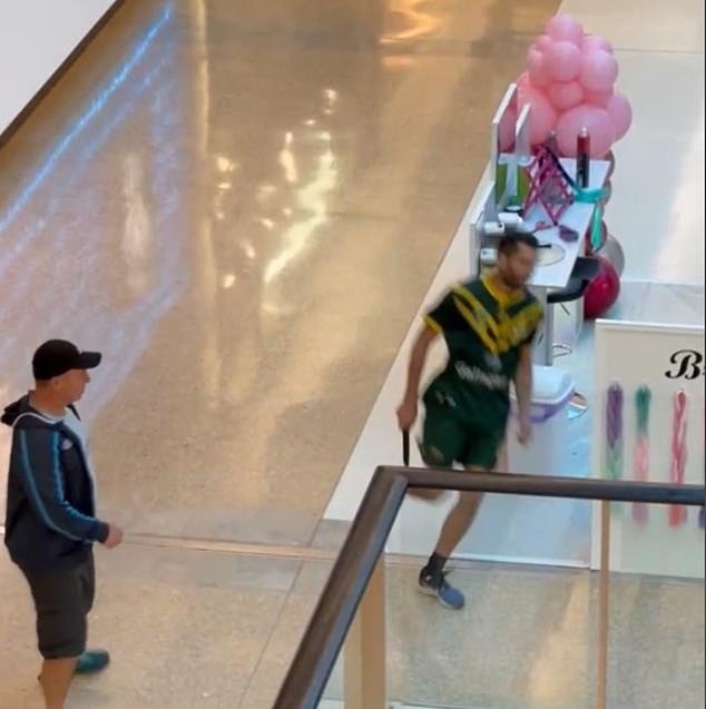 Joel Cauchi is pictured (right) holding a knife as he goes on his murderous spree in Sydney's Bondi Junction Westfield