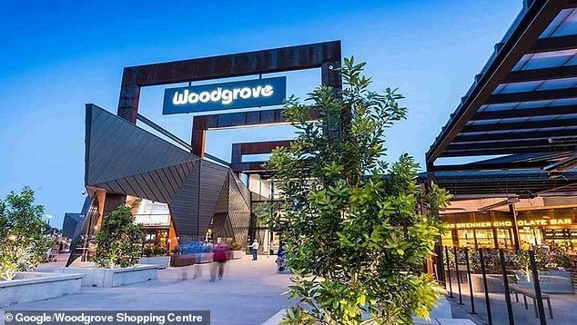 A bloody brawl broke out between a group of men, some brandishing machetes, at the Woodgrove Shopping Center in Melton, in Melbourne's northwest, on Monday.