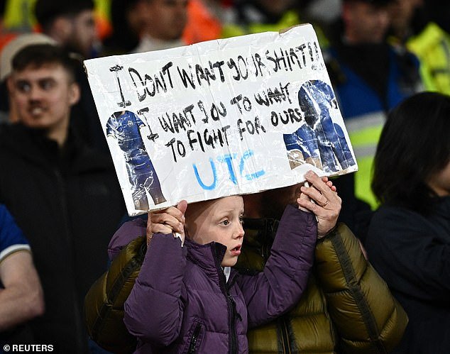 A young Chelsea fan held up a sign to tell the players he didn't want their shirts and instead told them to fight for the kit - a damning assessment during a heavy 5-0 defeat to Arsenal