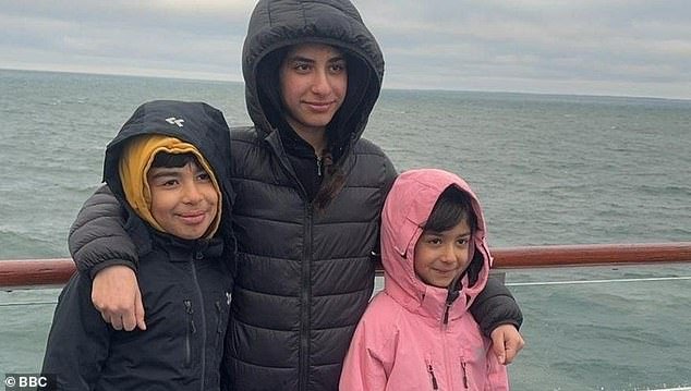 Sara (right) with her brother Hussam (left) and sister Rahaf (center)