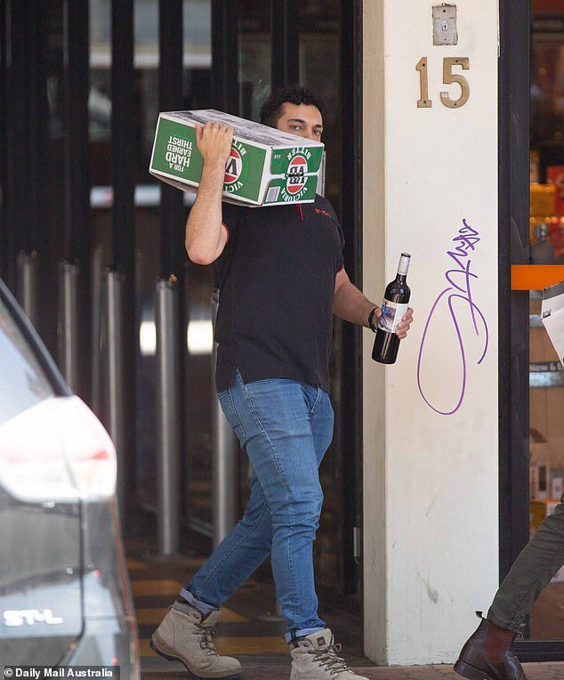 A second glass of beer or wine can have serious consequences for vision and can increase the risk of age-related macular degeneration.  The photo shows an Australian stocking up on alcohol