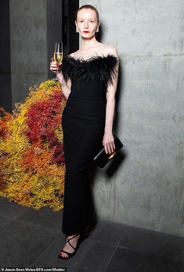 Designer Zizi Donohoe wore a feather black dress